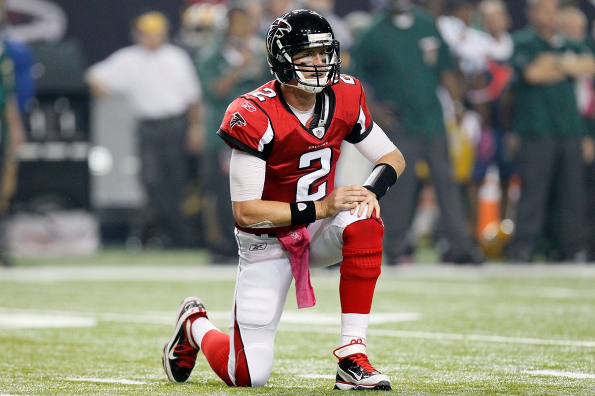 ATLANTA, GA - OCTOBER 09:  Matt Ryan #2 of the Atlanta Falcons kneels on the ground during the game against the Green Bay Packers at Georgia Dome on October 9, 2011 in Atlanta, Georgia.  (Photo by Kevin C. Cox/Getty Images)