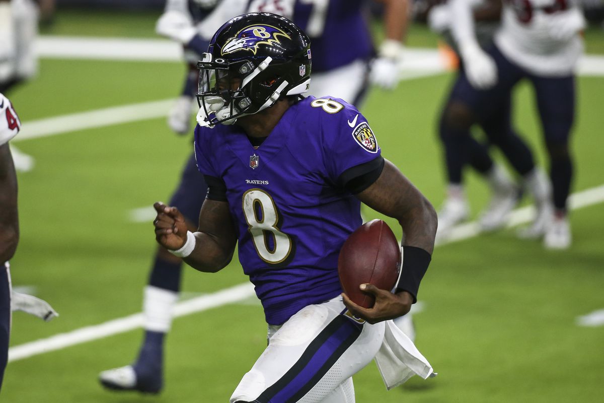 Baltimore Ravens quarterback Lamar Jackson (8) runs with the ball during the fourth quarter against the Houston Texans at NRG Stadium