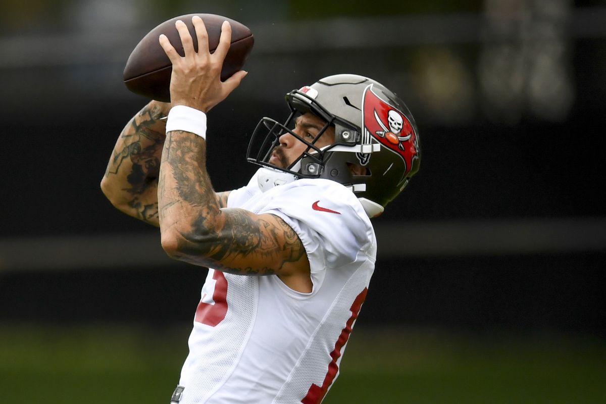 Mike Evans of the Tampa Bay Buccaneers makes a reception during training camp at AdventHealth Training Center on Aug