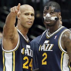 Utah Jazz Richard Jefferson (24) goes over a play with teammate Marvin Williams (2) during a timeout in the second half of an NBA basketball game against the Dallas Mavericks on Friday, Nov. 22, 2013, in Dallas. Dallas won 103-93. (AP Photo/Brandon Wade)