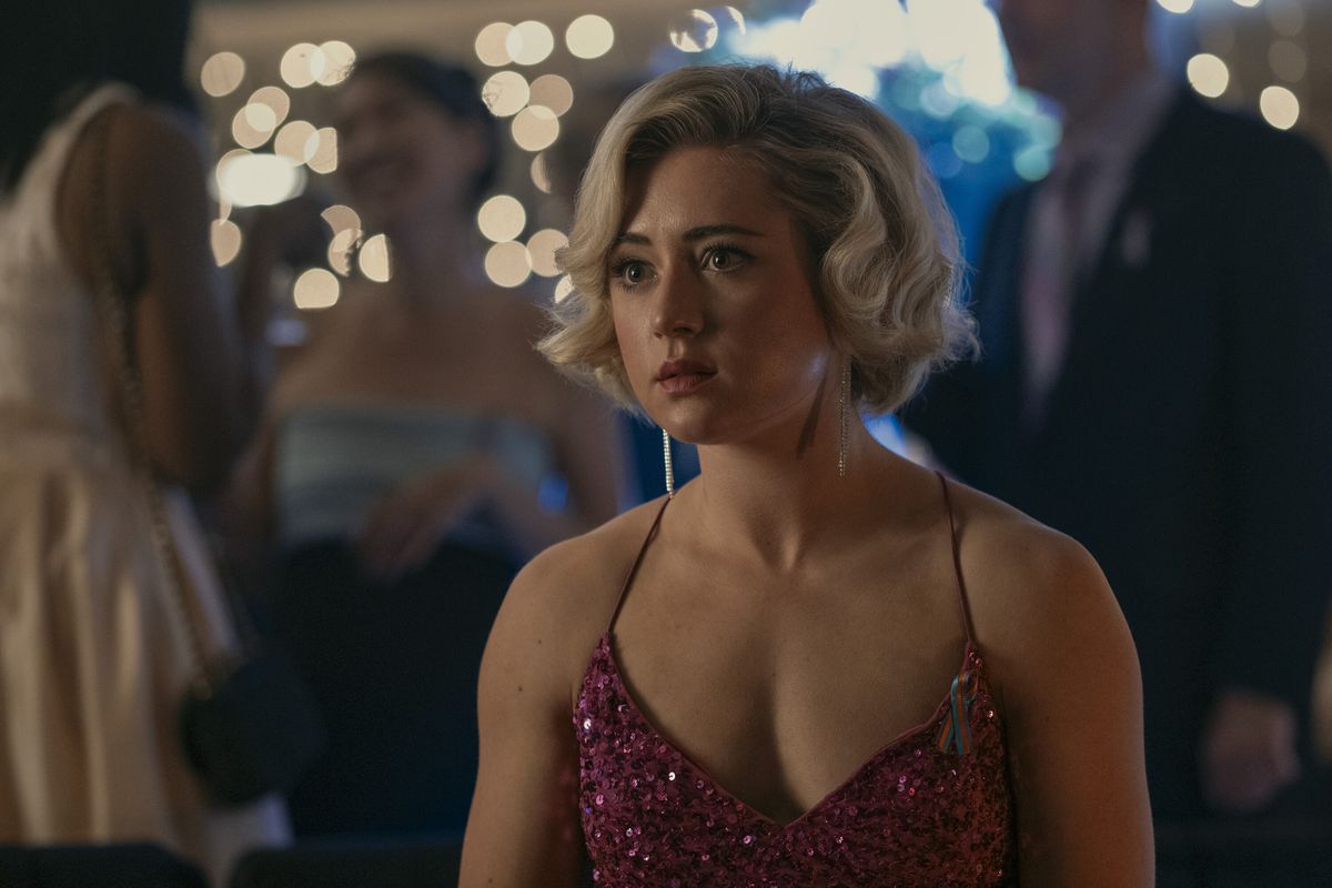 Emma Meyer attends a party in a fancy dress with her hair in a bob in an episode of Prime Video’s Gen V