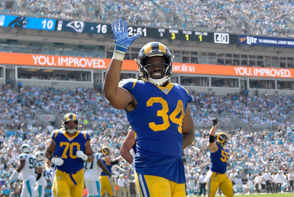 Los Angeles Rams RB Malcolm Brown politely waves to the crowd after scoring a touchdown against the Carolina Panthers in Week 1, Sep. 8, 2019.