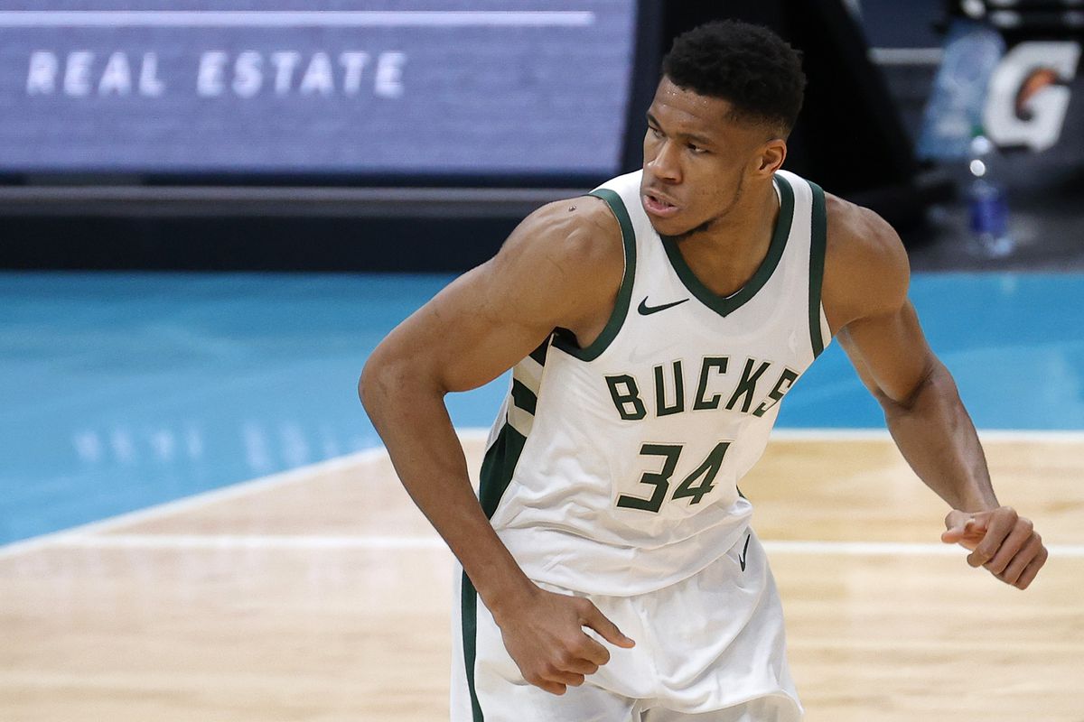 Giannis Antetokounmpo of the Milwaukee Bucks reacts following a play during the second quarter of their game against the Charlotte Hornets at Spectrum Center on January 30, 2021 in Charlotte, North Carolina.&nbsp;