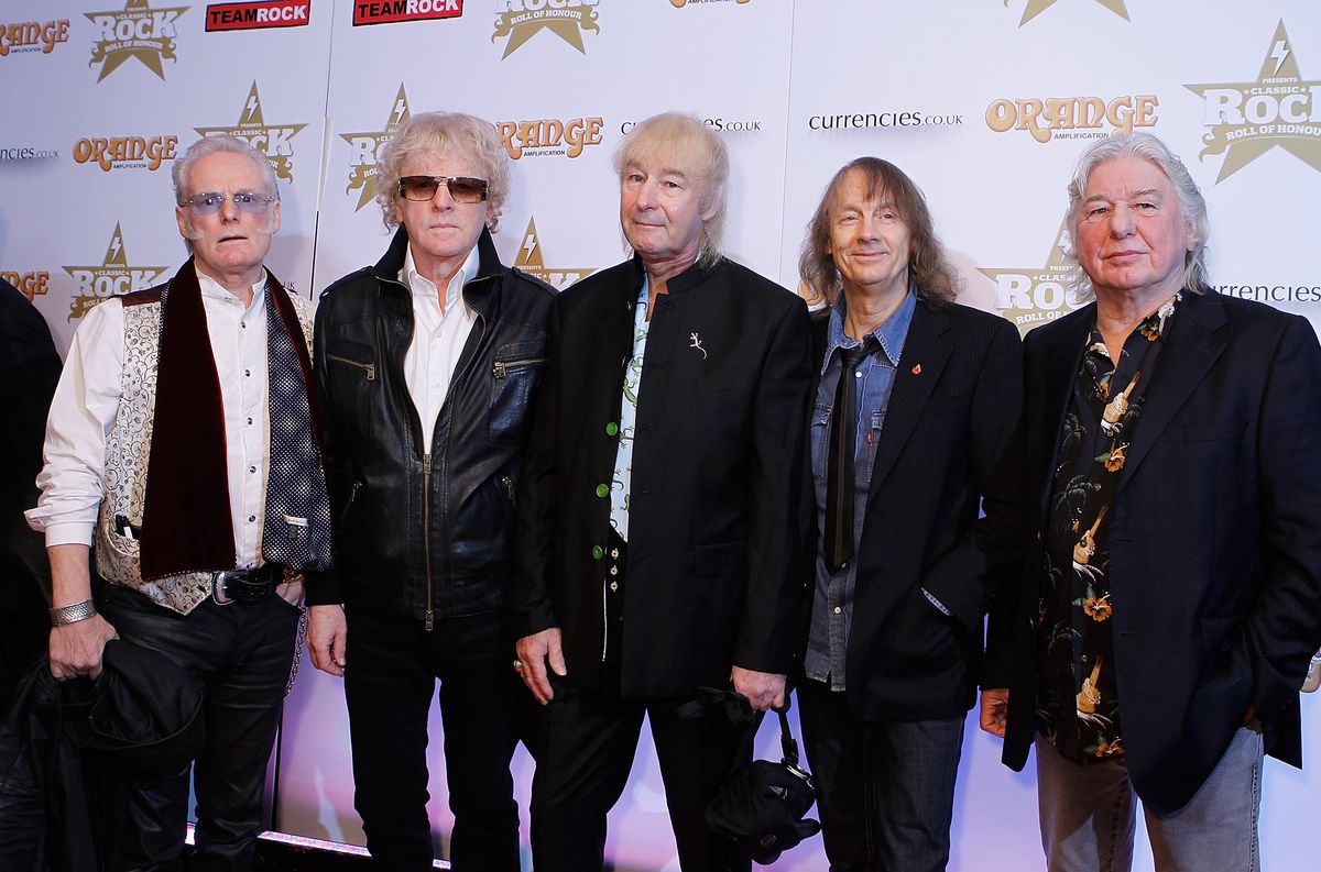 Ian Hunter (second from left) and his band Mott the Hoople attend the Classic Rock Roll of Honour at The Roundhouse on November 14, 2013, in London. | Jo Hale/Getty Images