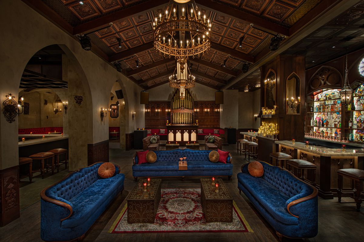 Lounge area of Sinners y Santos in Downtown LA’s Level 8 project with Catholic-style Gothic decor.