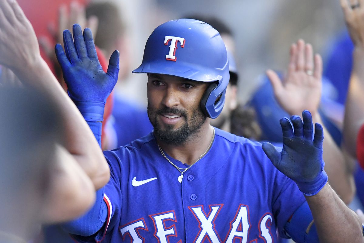 Marcus Semien #2 of the Texas Rangers is congratulated on his three-run home run in the fourth inning against the Los Angeles Angels at Angel Stadium of Anaheim&nbsp;
