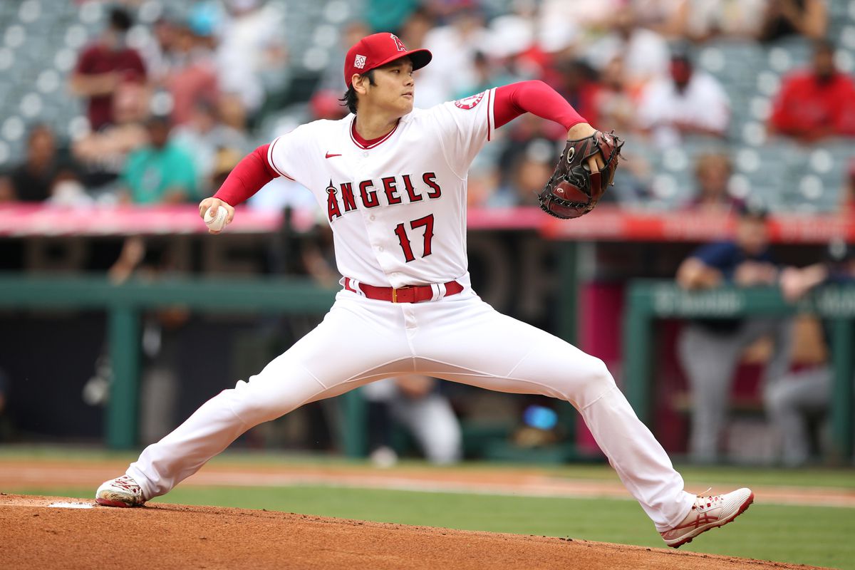 Shohei Ohtani #17 of the Los Angeles Angels throws a pitch during the first inning against the Seattle Mariners at Angel Stadium of Anaheim on September 26, 2021 in Anaheim, California.