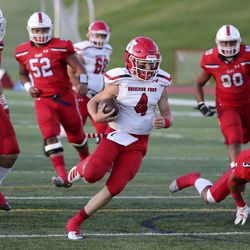 American Fork’s Maddux Madsen runs with the ball during a football game against East High School at East High School in Salt Lake City on Friday, Sept. 6, 2019.