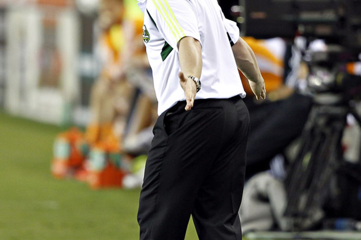 HOUSTON - MAY 15: Head coach John Spencer of the Portland Timbers yells at his players in the first half against the Houston Dynamo at BBVA Compass Stadium on May 15, 2012 in Houston, Texas. (Photo by Bob Levey/Getty Images)