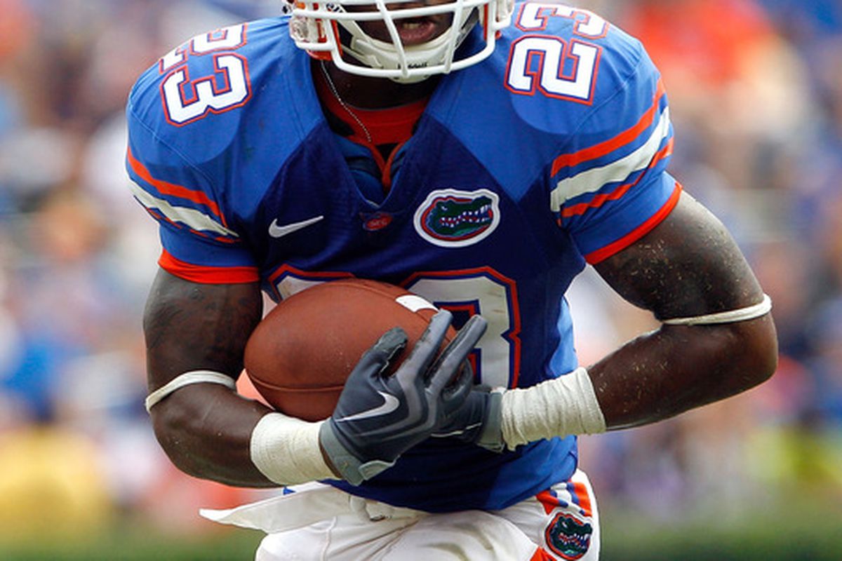 GAINESVILLE FL - SEPTEMBER 04:  Mike Gillislee #23 of the Florida Gators runs for yardage against the Miami University RedHawks at Ben Hill Griffin Stadium on September 4 2010 in Gainesville Florida.  (Photo by Sam Greenwood/Getty Images)