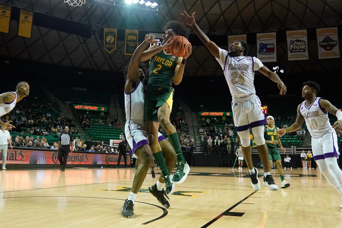 Baylor Bears guard Kendall Brown looks to score between Alcorn State Braves guard Mike Pajeaud and Alcorn State Braves center Darrious Agnew and during the second half at Ferrell Center.
