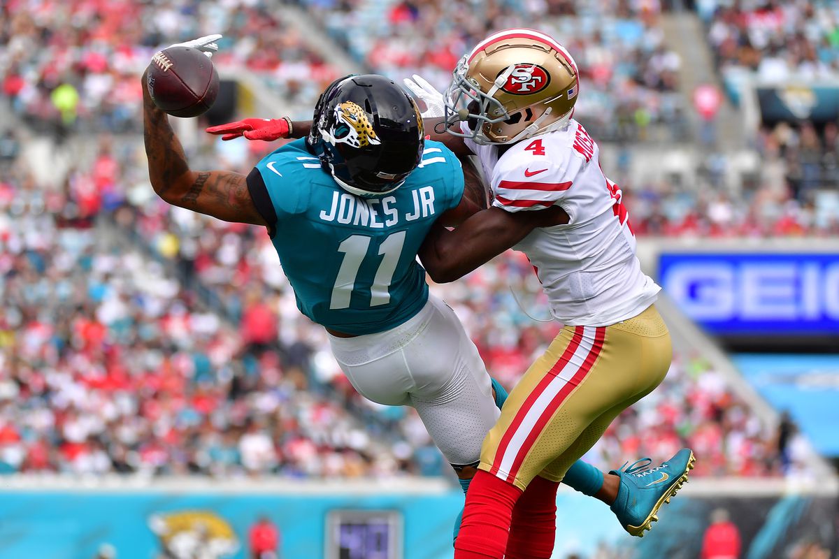 Emmanuel Moseley #4 of the San Francisco 49ers breaks up a pass intended for Marvin Jones #11 of the Jacksonville Jaguars during the second quarter at TIAA Bank Field on November 21, 2021 in Jacksonville, Florida.