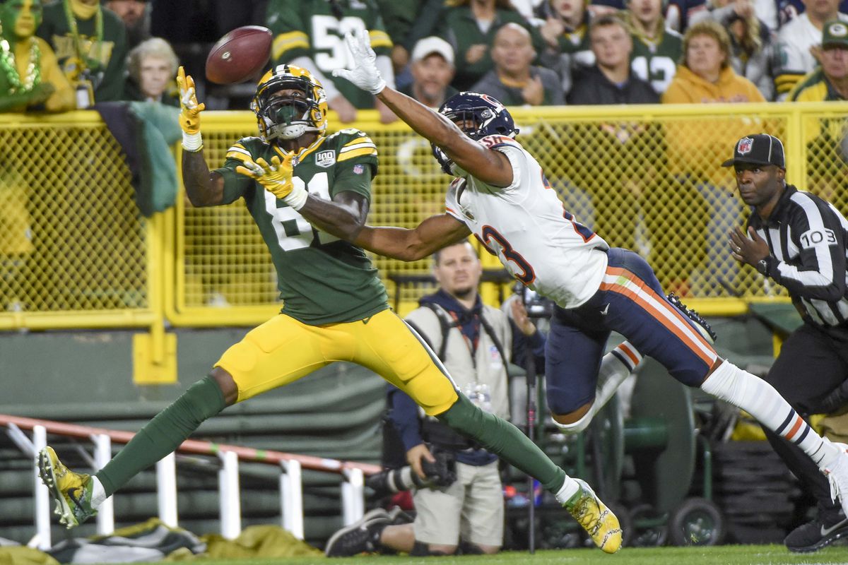 Green Bay Packers wide receiver Geronimo Allison catches a pass for a touchdown against Chicago Bears cornerback Kyle Fuller in the third quarter at Lambeau Field.