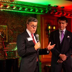 Ron Gunnell, assistant to the president of the Tabernacle Choir at Temple Square, left, speaks to a crowd gathered at Feinstein’s/54 Below in New York on Wednesday, Dec. 8, 2021. The event was held to celebrate a $100,000 donation by the choir to the Actors Fund, a charity that provides a safety net for performing arts and entertainment professionals.