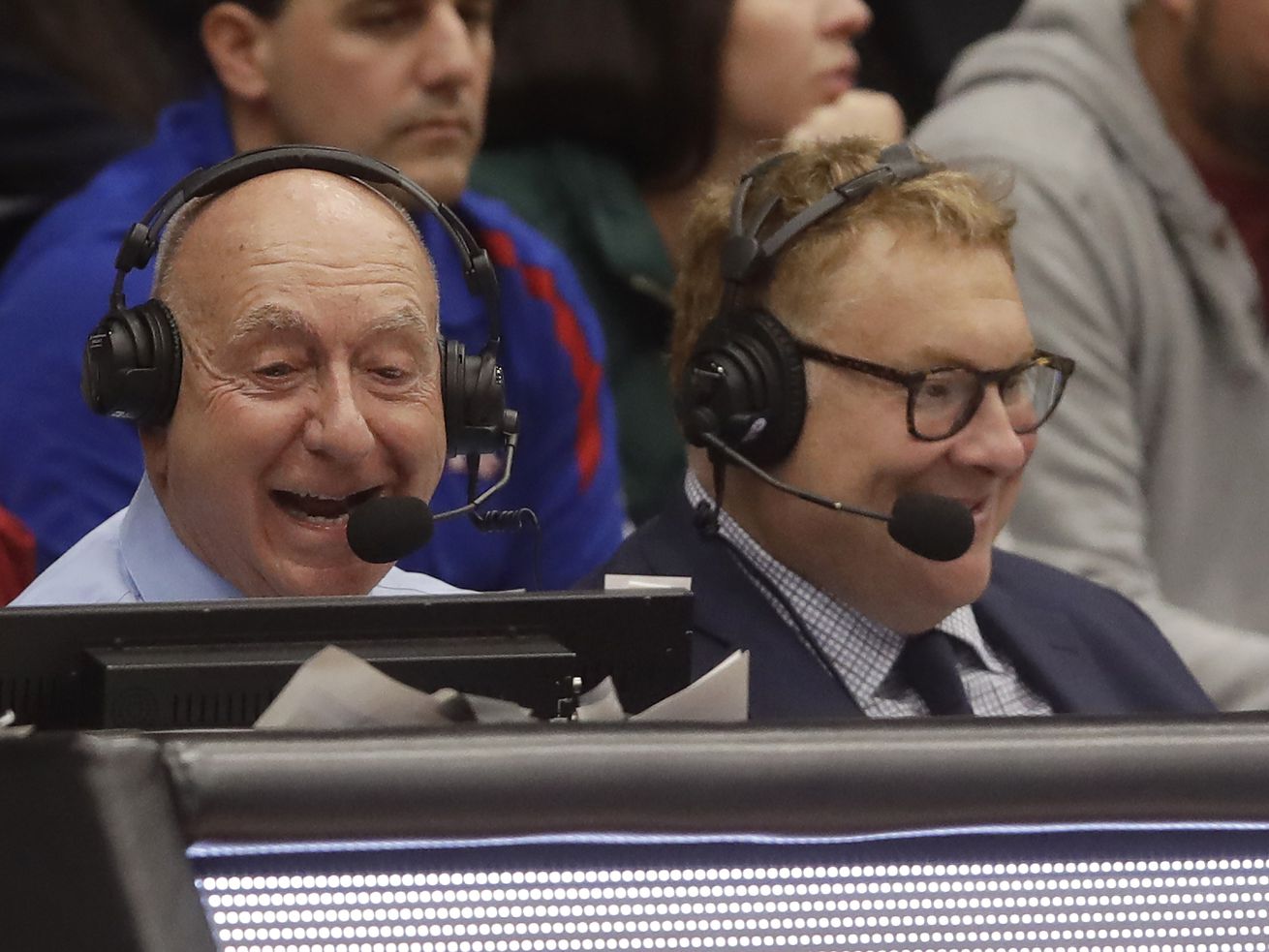 New Cubs television broadcaster Jon Sciambi, right, calls a college basketball game with Dick Vitale in 2019. 