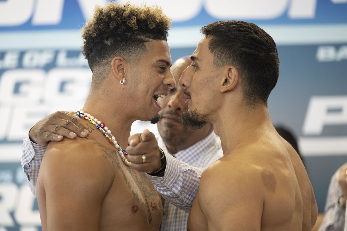 Austin McBroom, left, faces off with AnEson Gib weighs in for their bout that will be held at Banc of California Stadium on September 9, 2022 in Los Angeles, California.