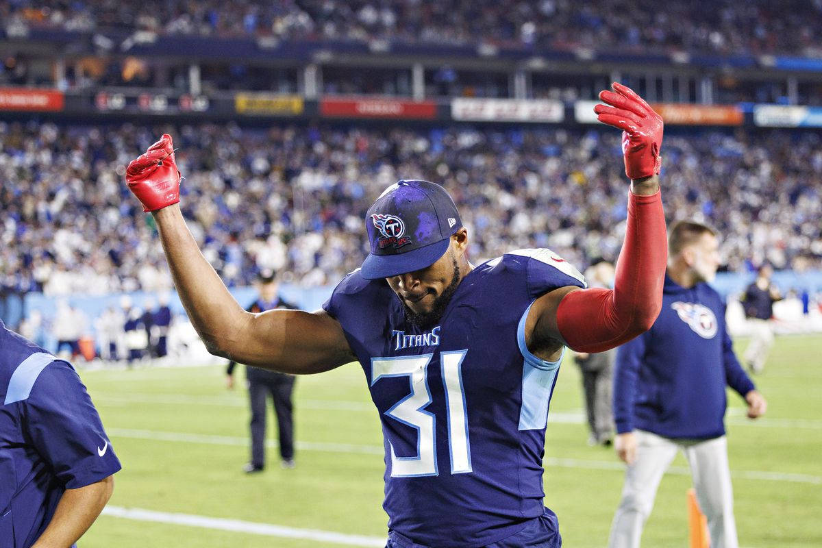Kevin Byard #31 of the Tennessee Titans signals to the fans on the way to the locker room after having two interceptions in the first half against the Dallas Cowboys at Nissan Stadium on December 29, 2022 in Nashville, Tennessee.