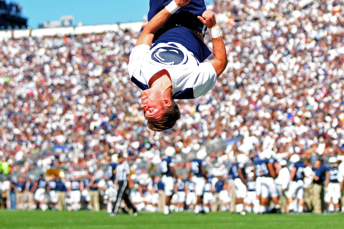 A Penn State cheerleader attempts to distract fans from a huge, embarassing, failure.