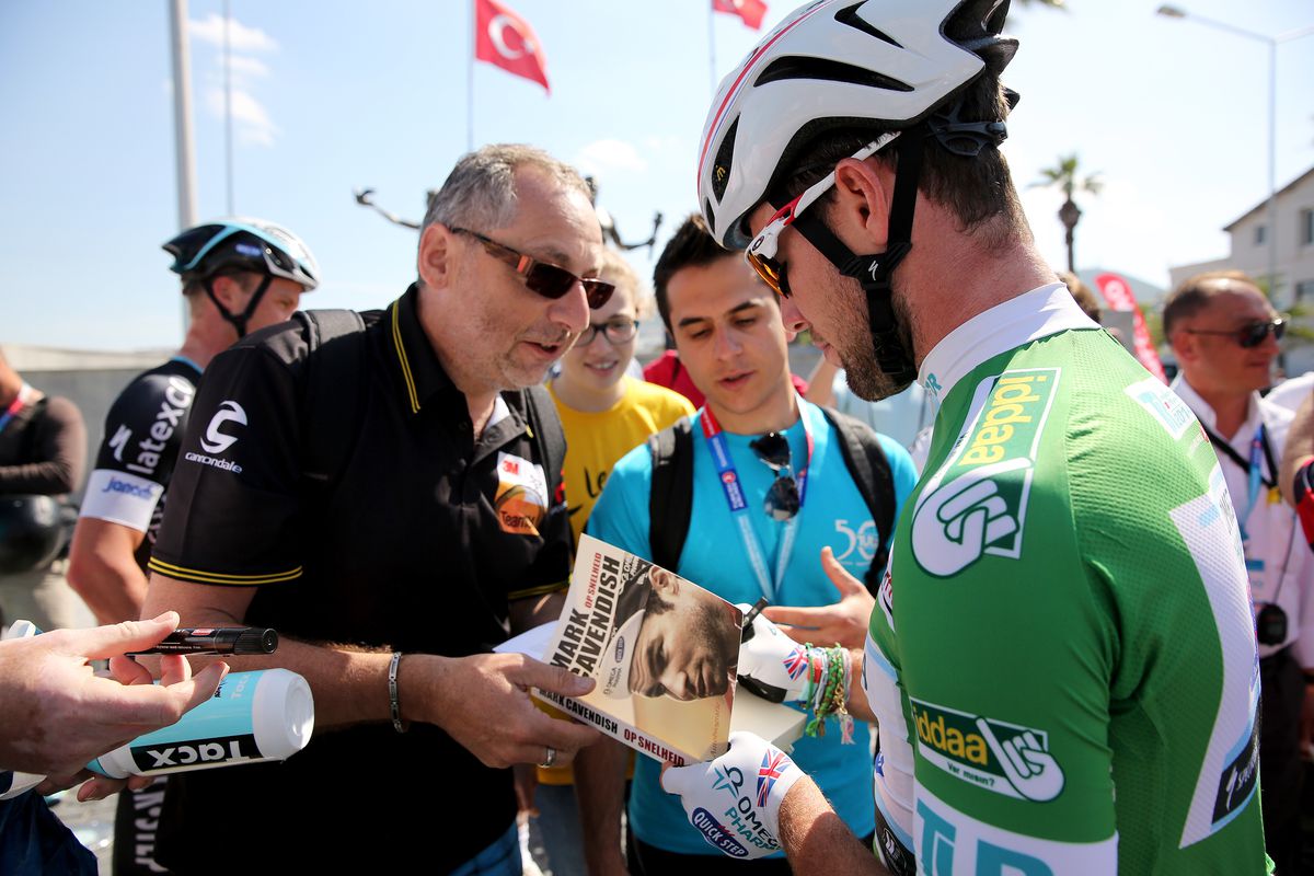 Tour of Turkey, 2014: Mark Cavendish signs a copy of his book