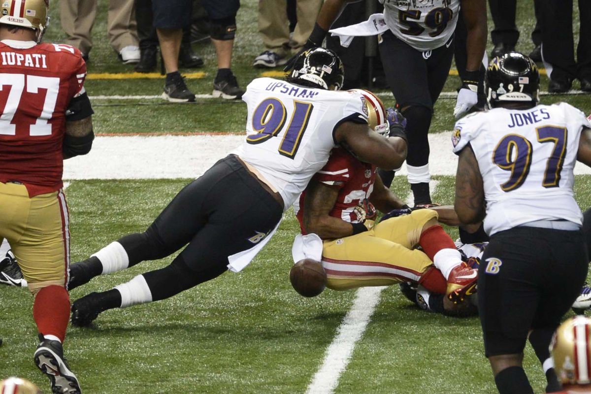 LB Courtney Upshaw forces a fumble on RB LaMichael James in Super Bowl XLVII in February.