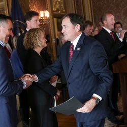 Gov. Gary Herbert shakes hands with House Speaker Greg Hughes, R-Draper, after announcing the federal Health and Human Services Department has approved Utah's long-awaited Medicaid waiver during a press conference at the Capitol in Salt Lake City on Wednesday, Nov. 1, 2017. The waiver will bring in roughly $100 million for 4,000 to 6,000 poor Utahns without children.