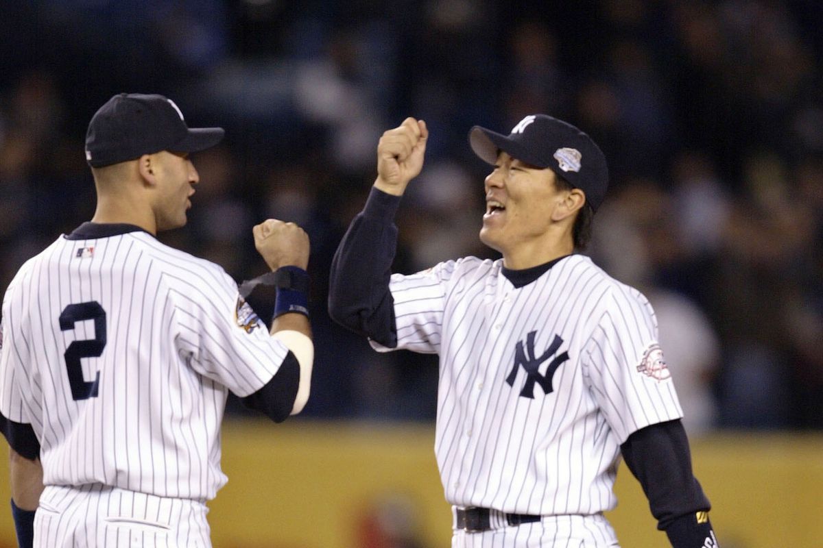 Matsui celebrates with Jeter
