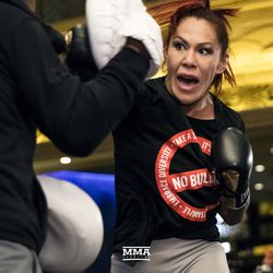 Cris Cyborg shows off her hands at UFC 222 workouts.