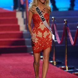 Miss Nebraska Ellie Lorenzen walks onstage during the Miss USA 2013 pageant, Sunday, June 16, 2013, in Las Vegas. (AP Photo/Jeff Bottari)