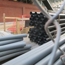7:20 p.m. Stacks of pipes on Waveland - 
