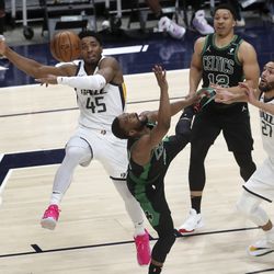 Utah Jazz guard Donovan Mitchell (45) blocks a shot during the Boston Celtics at Utah Jazz NBA basketball game at Vivint Smart Home Arena in Salt Lake City on Tuesday, Feb. 9, 2021.