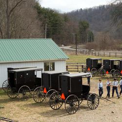 Amish boys walk to the school house for their final day of class in Bergholz, Ohio on Tuesday, April 9, 2013. 