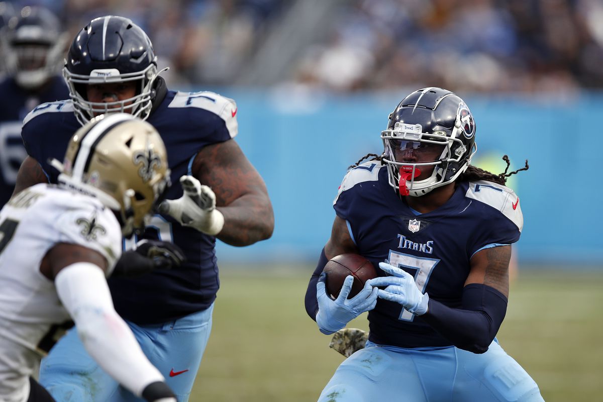 D’Onta Foreman #7 of the Tennessee Titans runs with the ball against the New Orleans Saints during the second half at Nissan Stadium on November 14, 2021 in Nashville, Tennessee.