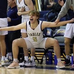 Coltan Smith of Skyline celebrates how he and Lehi play in the first round of 5A Utah High School on Skyline in Salt Lake City on Wednesday, February 23, 2022.  Skyline won 60-54 in overtime.