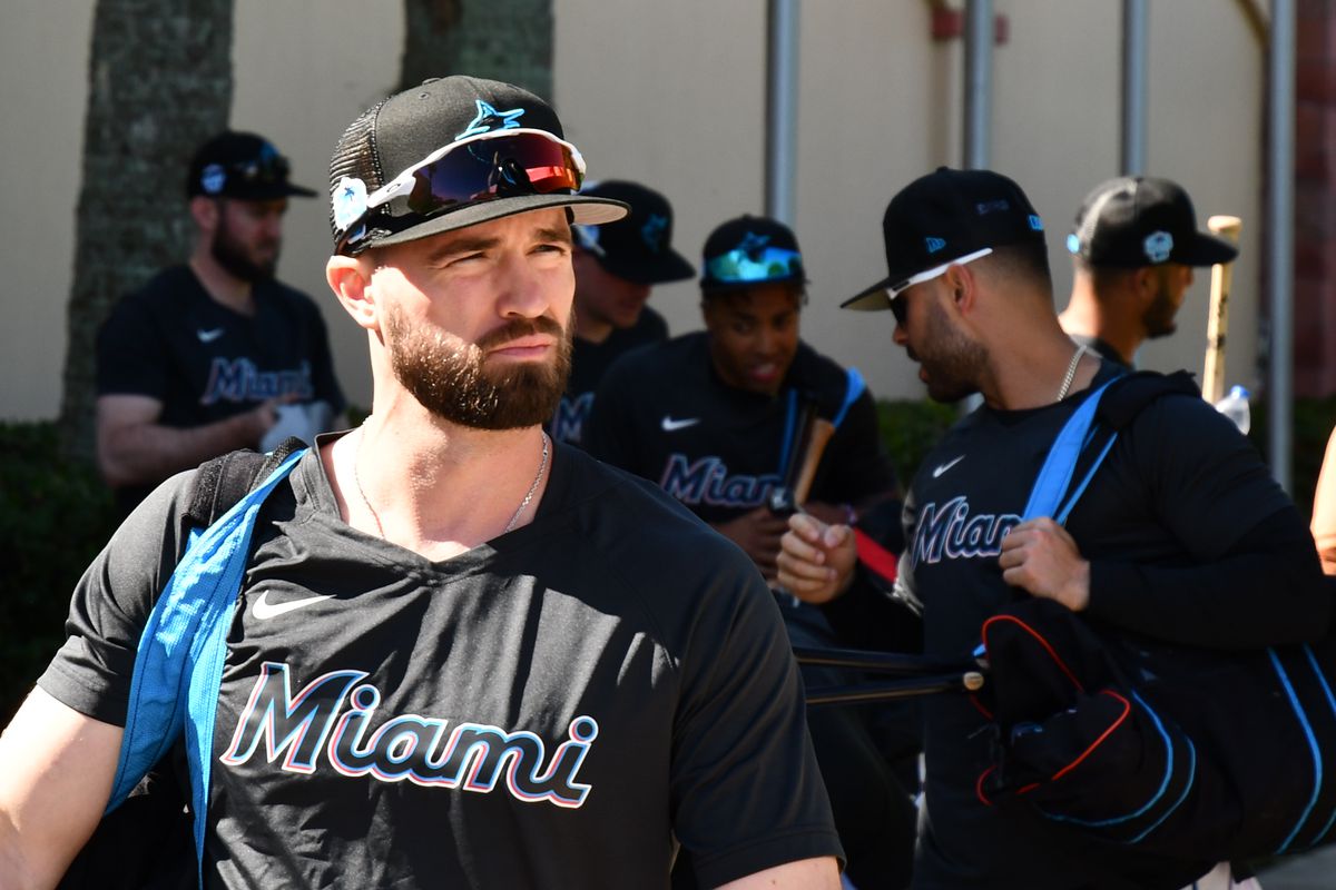 Jon Berti walks out of the clubhouse toward the practice fields at Roger Dean Chevrolet Stadium during 2023 Marlins Spring Training