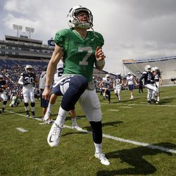 Brigham Young Cougars quarterback Beau Hoge (7) warms up before a spring football scrimmage at LaVell Edwards Stadium in Provo, Saturday, March 26, 2016.