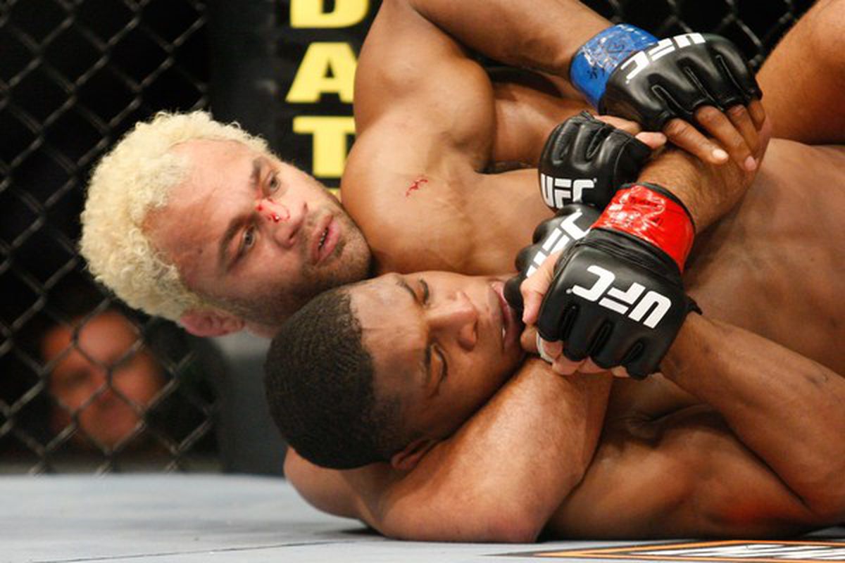 MONTREAL- MAY 8: Josh Koscheck (L) holds on to Paul Daley in their welter weight bout at UFC 113 at Bell Centre on May 8, 2010 in Montreal, Quebec, Canada.  (Photo by Richard Wolowicz/Getty Images)