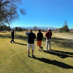 Golfers get in some time at Bonneville Golf Course in Salt Lake City as warm temperatures Sunday, Feb. 8, 2015, allow numerous activities from skiing and snowboarding, to golfing, biking and hiking along the Wasatch Front.