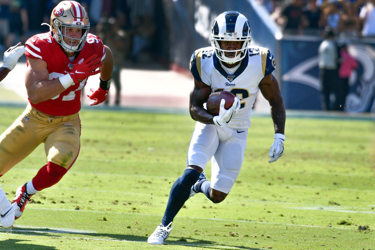 Los Angeles Rams WR Brandin Cooks runs past San Francisco 49ers EDGE Nick Bosa in Week 6, Oct. 13, 2019.