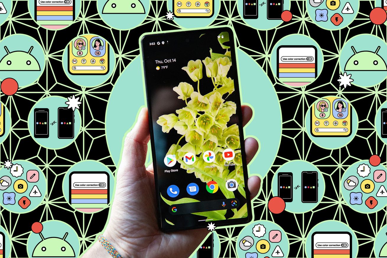 Hand holding Android phone against illustrated background