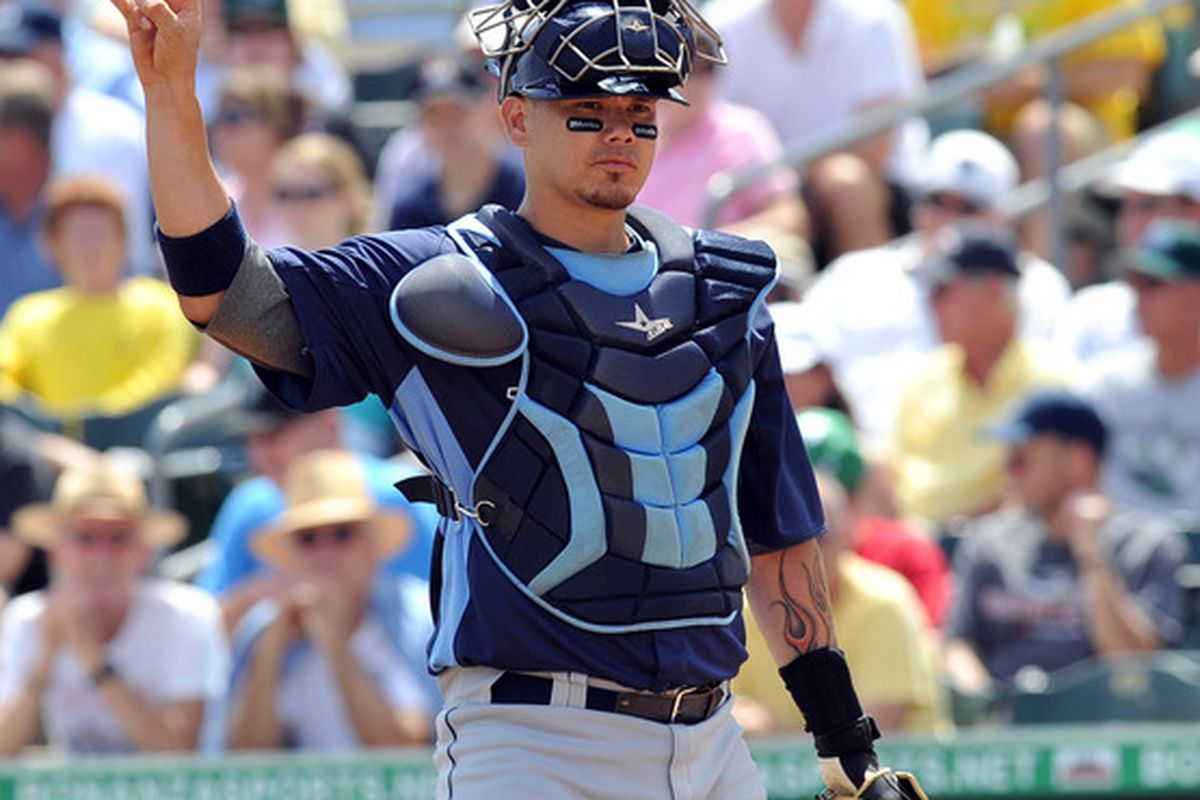 March 20, 2012; Jupiter FL, USA; Tampa Bay Rays catcher Jose Lobaton (21) in the first inning against the Miami Marlins during a spring training game at Roger Dean Stadium. Mandatory Credit: Steve Mitchell-US PRESSWIRE