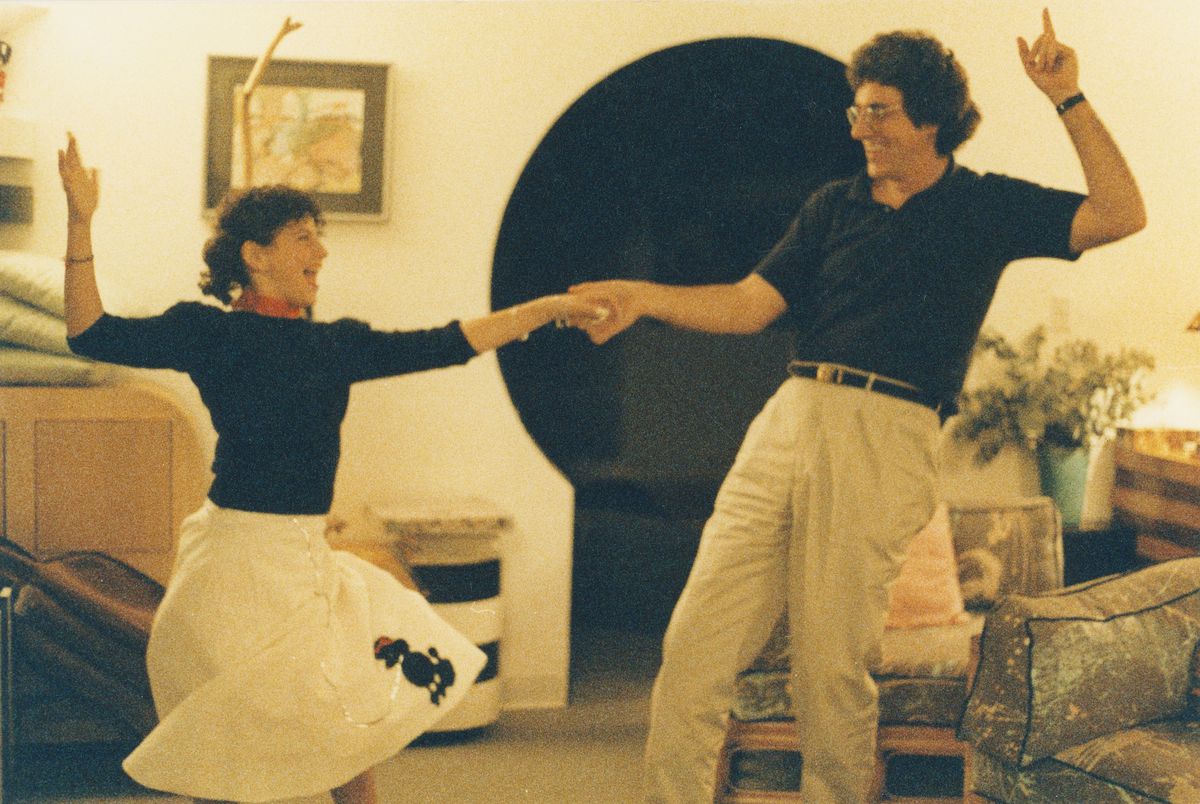 Violet dances with her father, Harold Ramis, in a 1980s photo from “Ghostbuster’s Daughter.” | Provided photo