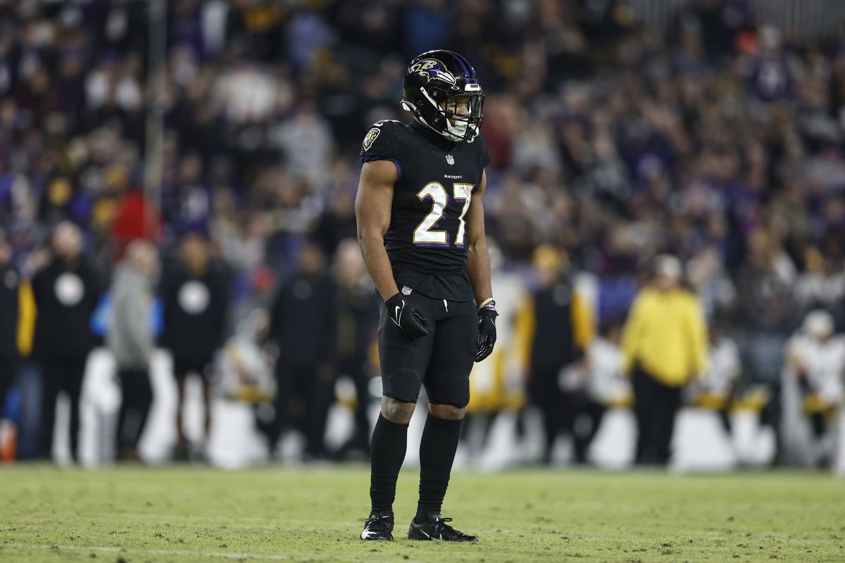 J.K. Dobbins #27 of the Baltimore Ravens looks on during an NFL football game between the Baltimore Ravens and the Pittsburgh Steelers at M&amp;T Bank Stadium on January 01, 2023 in Baltimore, Maryland.