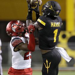 Arizona State wide receiver N'Keal Harry (1) makes the catch as Utah's Casey Hughes (25) defends during the first half of an NCAA college football game, Thursday, Nov. 10, 2016, in Tempe, Ariz. (AP Photo/Matt York)