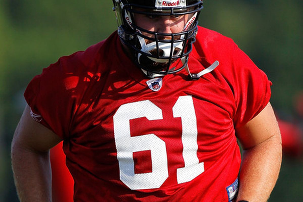 FLOWERY BRANCH GA - JULY 30:  Joe Hawley #61 of the Atlanta Falcons runs drills during opening day of training camp on July 30 2010 at the Falcons Training Complex in Flowery Branch Georgia.  (Photo by Kevin C. Cox/Getty Images)