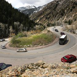 Vehicles make their way up and down Big Cottonwood Canyon on Friday, April 21, 2017.