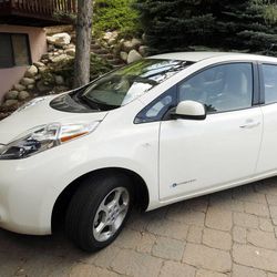 Michael Mielke's Nissan Leaf  at his home in Salt Lake City  Monday, June 25, 2012.  Mielke generates his own power through solar panels at his home. 