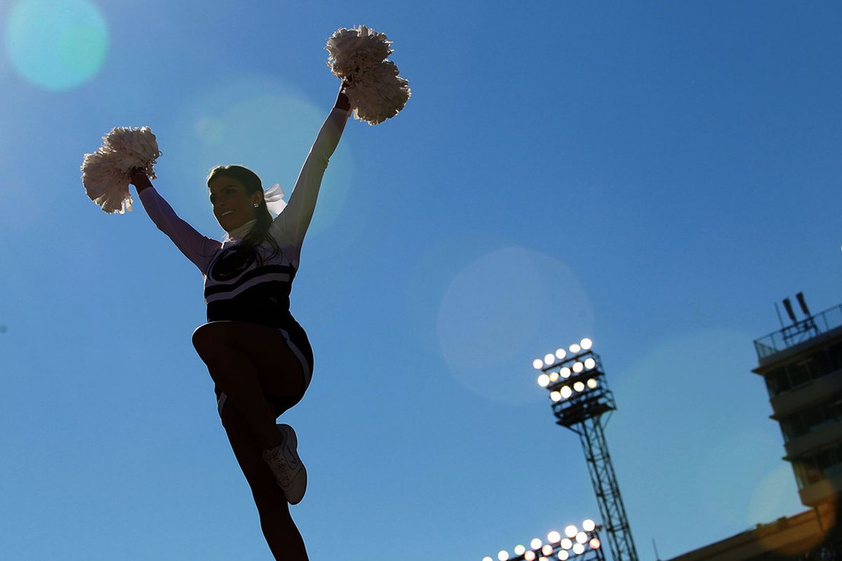 DALLAS, TX - JANUARY 02:  A Penn State Nittany Lions cheerleader performs during the TicketCity Bowl at Cotton Bowl Stadium on January 2, 2012 in Dallas, Texas.  (Photo by Ronald Martinez/Getty Images)