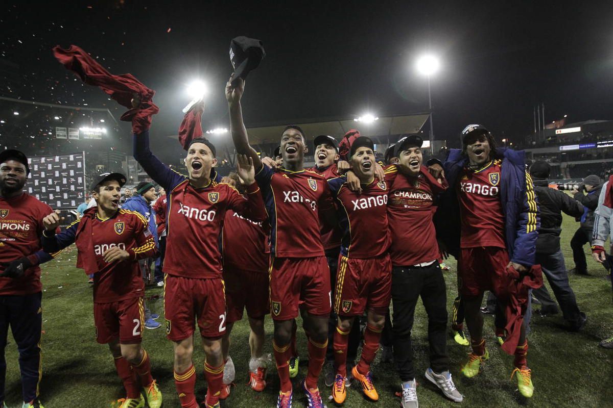 Real Salt Lake team members celebrate after winning the Western Conference finals in the MLS Cup soccer playoffs against the Portland Timbers Sunday, Nov. 24, 2013, in Portland, Ore. (AP Photo/Don Ryan)