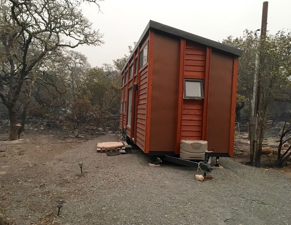 Escape tiny house that survived the fire.