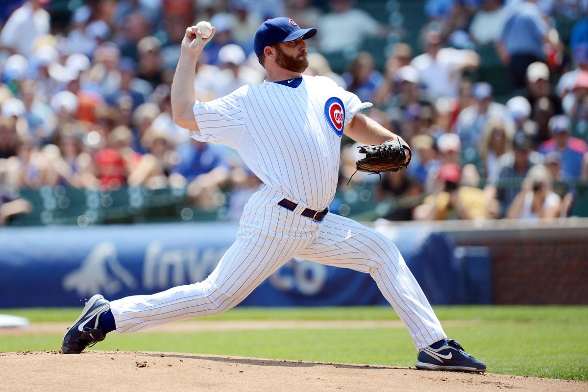July 14, 2012; Chicago, IL, USA; Chicago Cubs starting pitcher Ryan Dempster throws a pitch during the first inning against the Arizona Diamondbacks at Wrigley Field.  Mandatory Credit: Jerry Lai-US PRESSWIRE